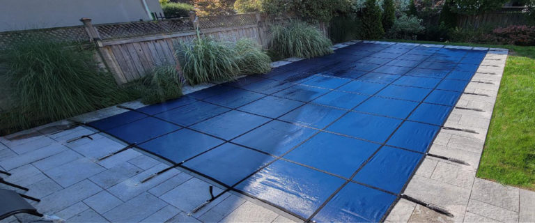 The Ultimate Guide to Keeping Your Pool Safe with Winter Safety Covers